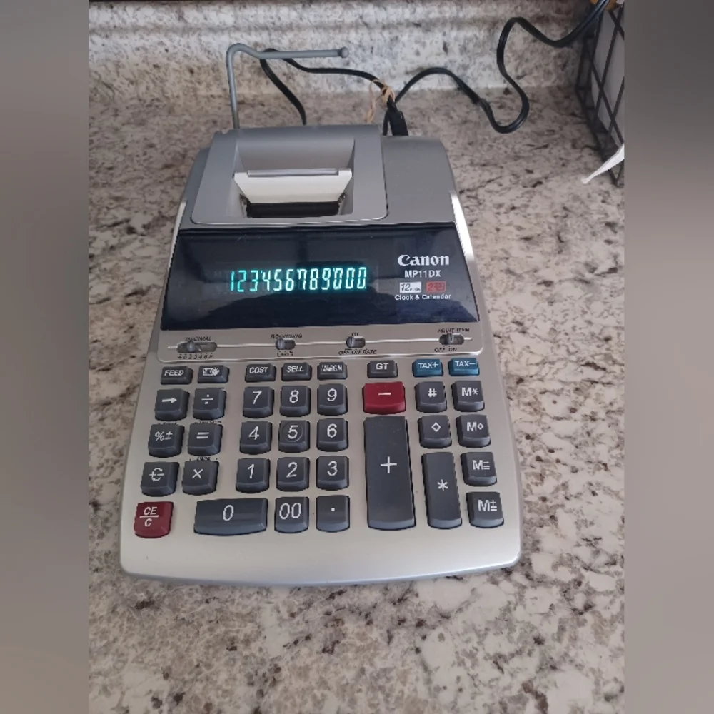 Canon digital printable calculator with time and calendar feature